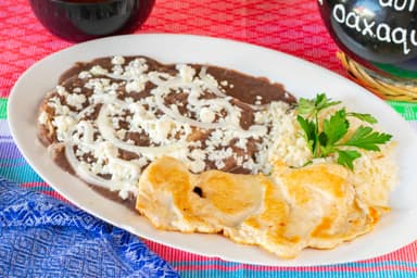 Enfrijoladas de Pechuga Asada