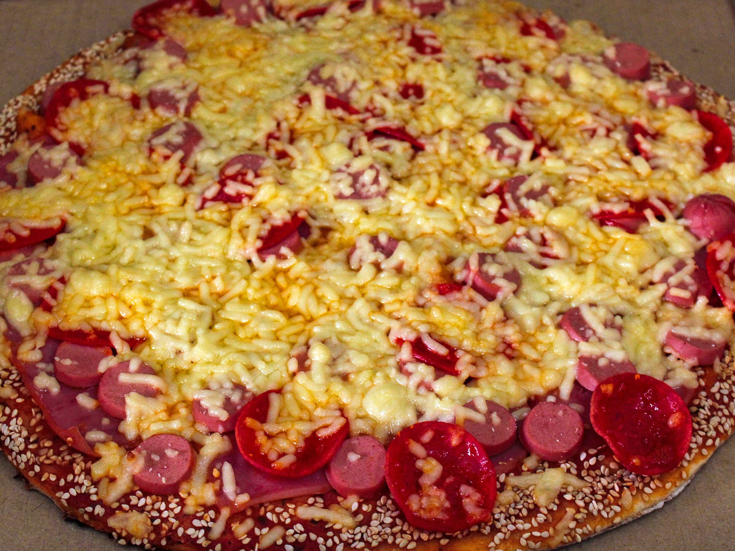 Pizza grande mitad peperoni-mexicana