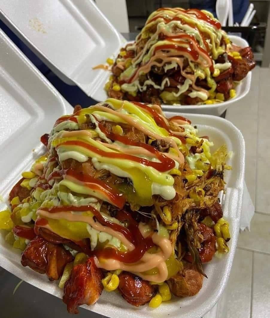 Salchipapa Mega Spinosaurio World