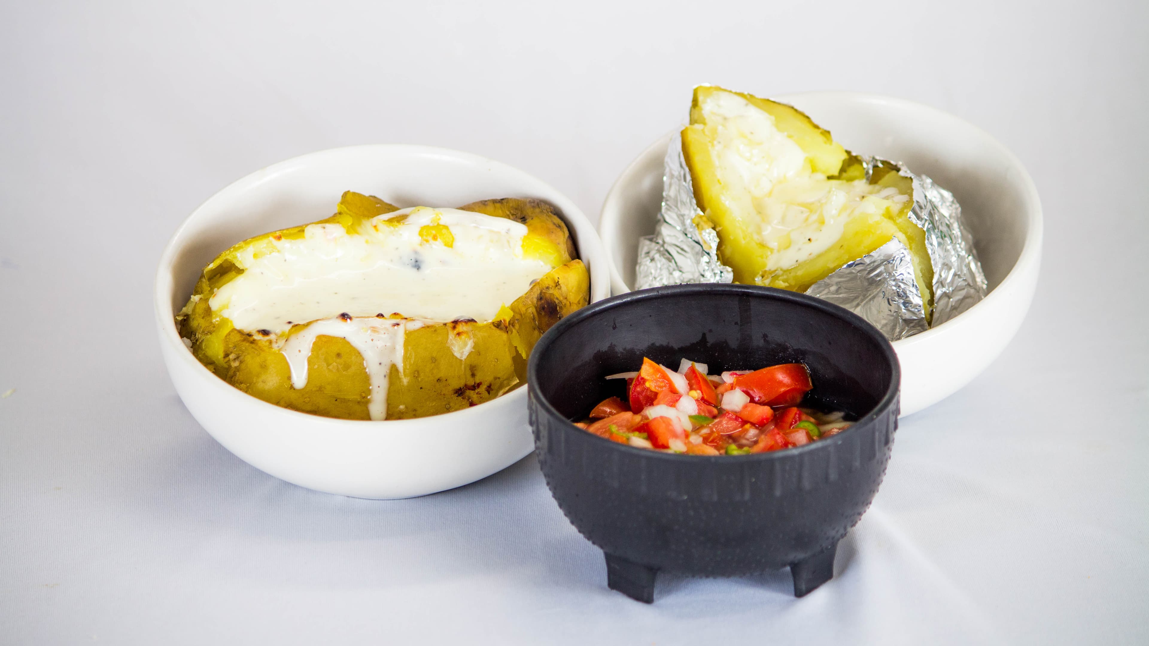 Papas con Chuleta de Cerdo y Queso Gratinado