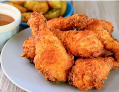 Paquete Con dos Muslos de Pollo Frito