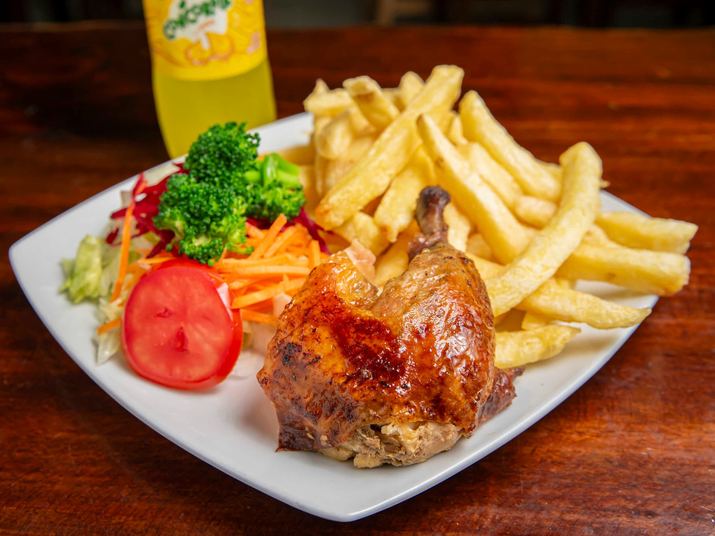 1/8 de Pollo a la Brasa más Gaseosa 355 ml
