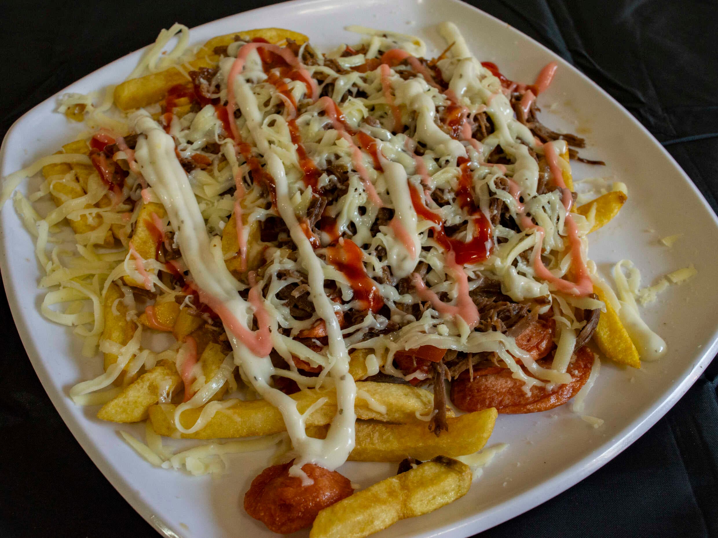 Salchipapa con Pollo