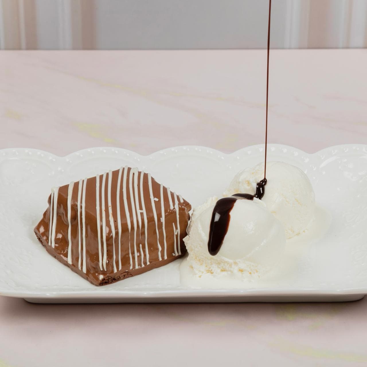 Brownie con Helado de vainilla