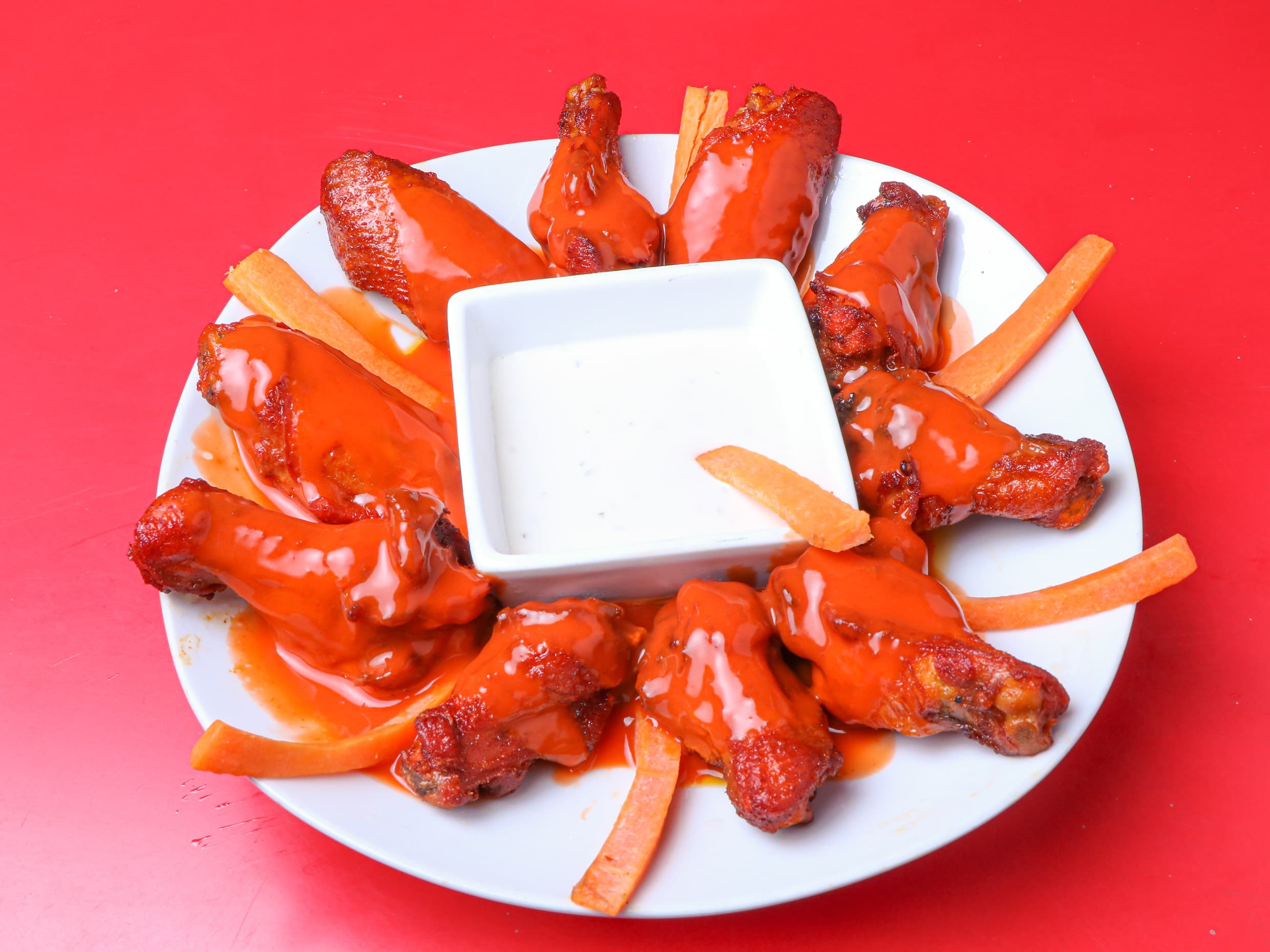 Alitas de Pollo con Salsa Búfalo