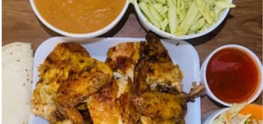 Medio Pollo + Refresco de 600 Ml.