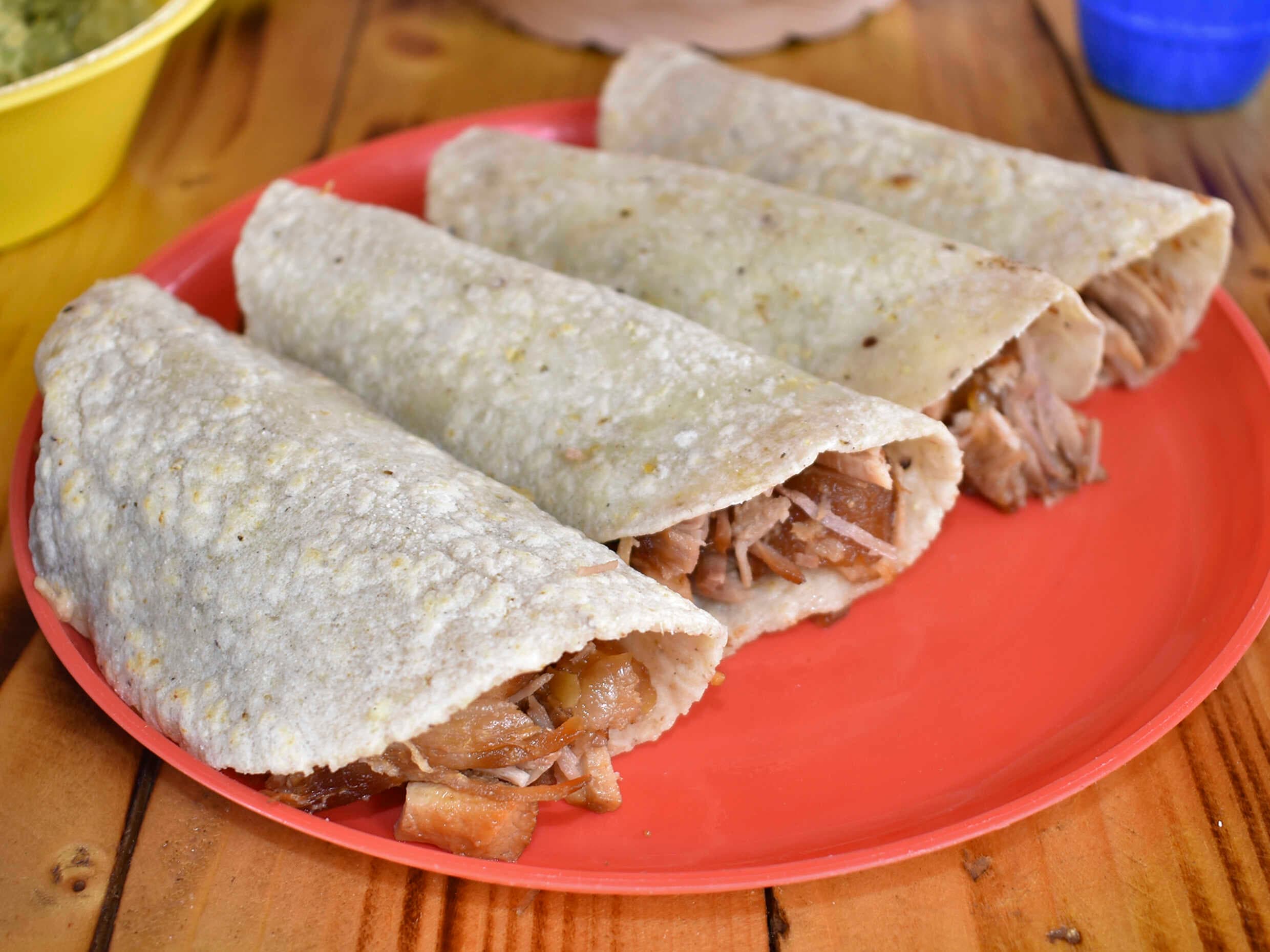 4 tacos de carnitas