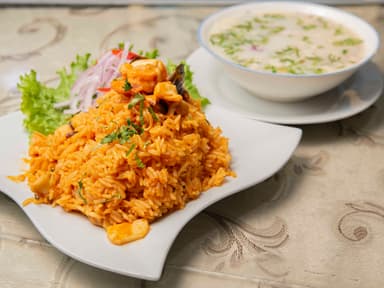 Arroz con Mariscos más Ceviche o Chilcano
