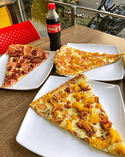 Porción de Pizza Personal + Coca Cola 250 Ml