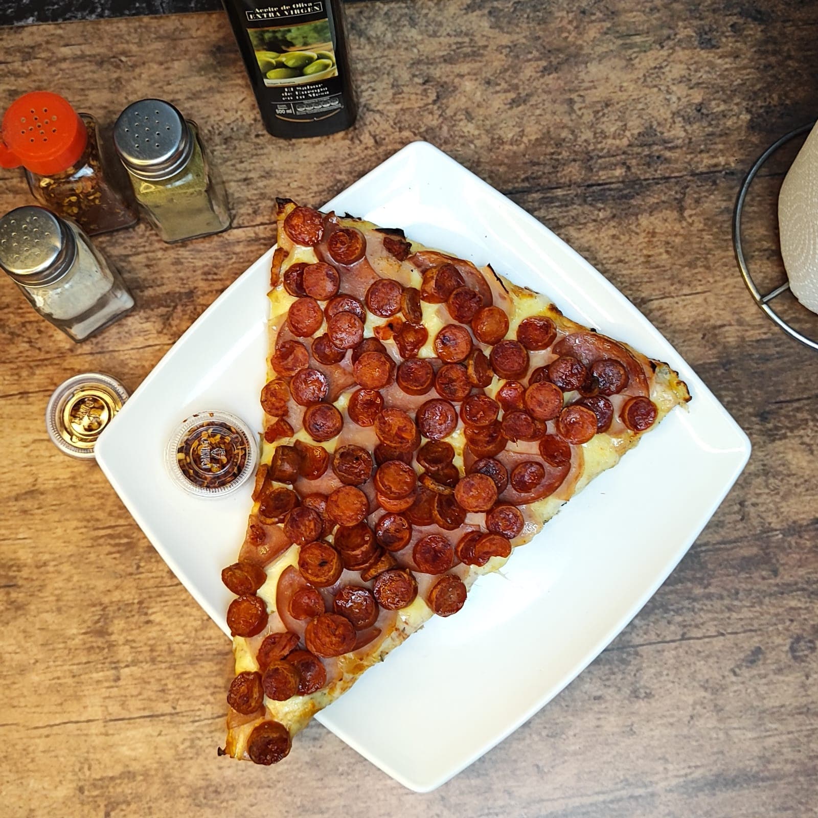 Pizza Tres Carnes.