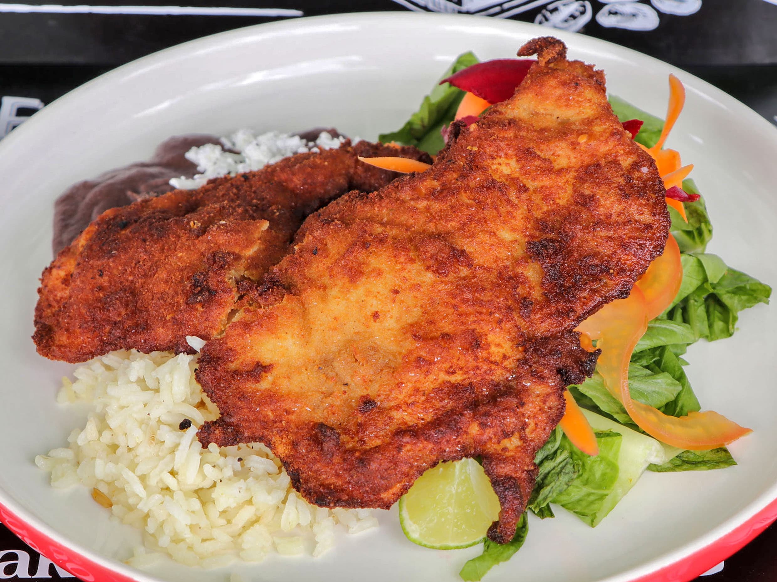 Milanesa de Res, pollo o cerdo preparadas.