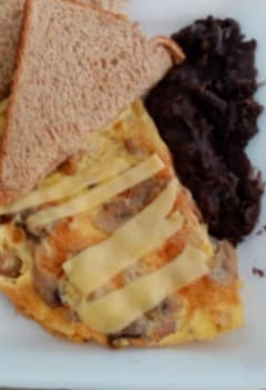 Omelette de champiñones