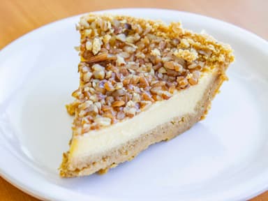Rebanada de Pay de Queso con Nuez