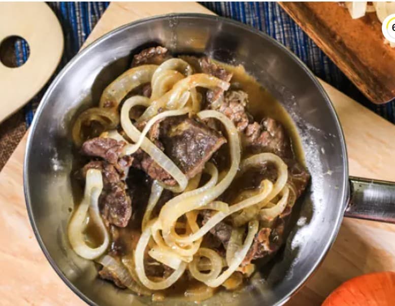 Bistec de Puerco en Encebollado