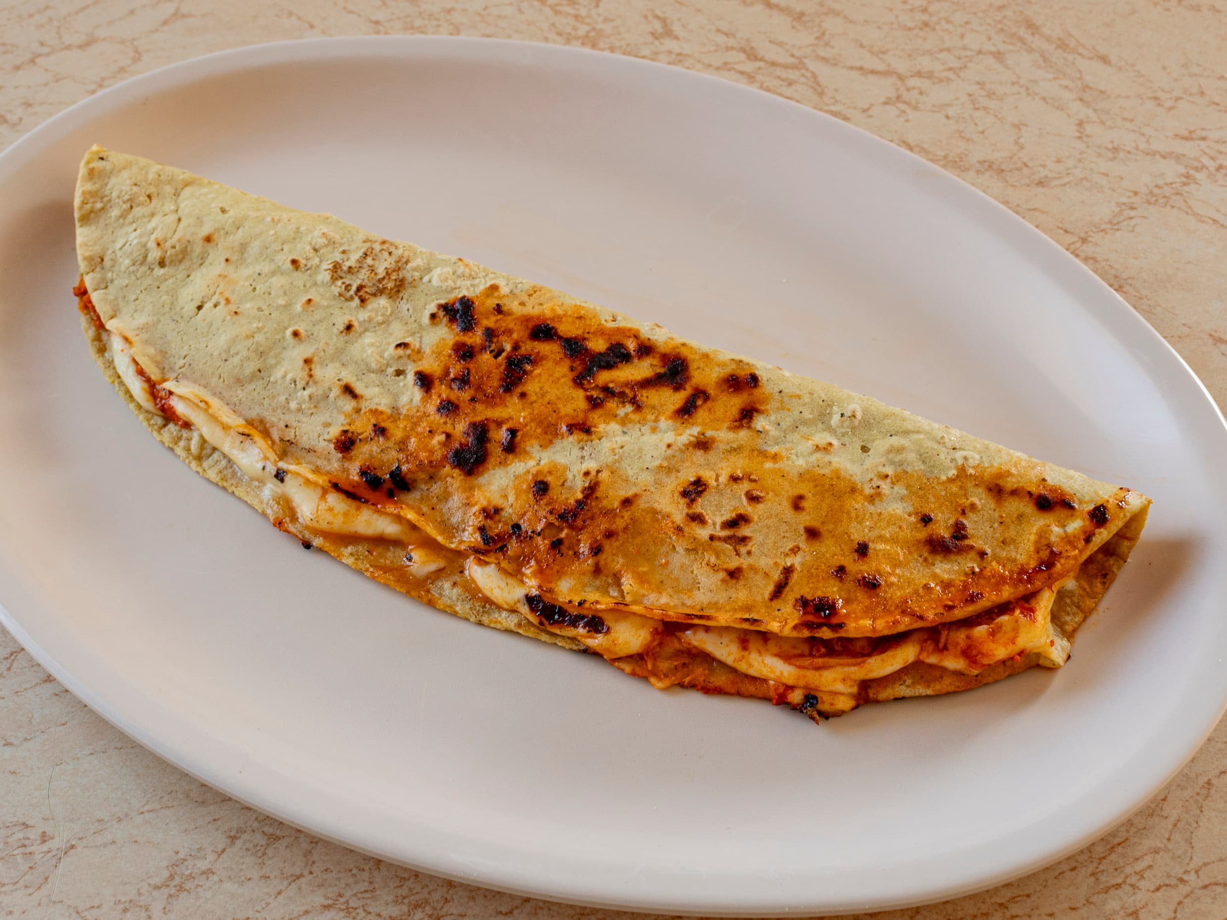 Queka de Tinga de Pollo.