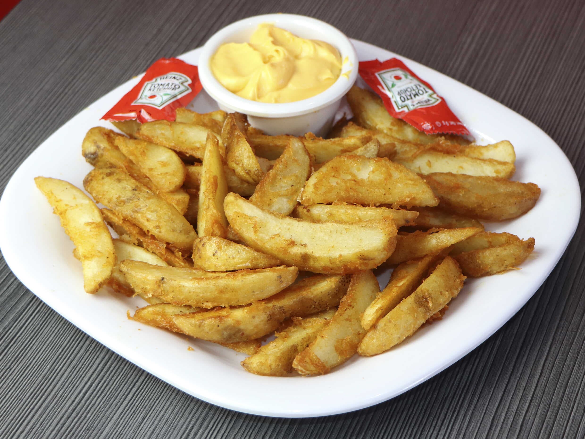 Combo Papas Sazonadas + Coca Cola