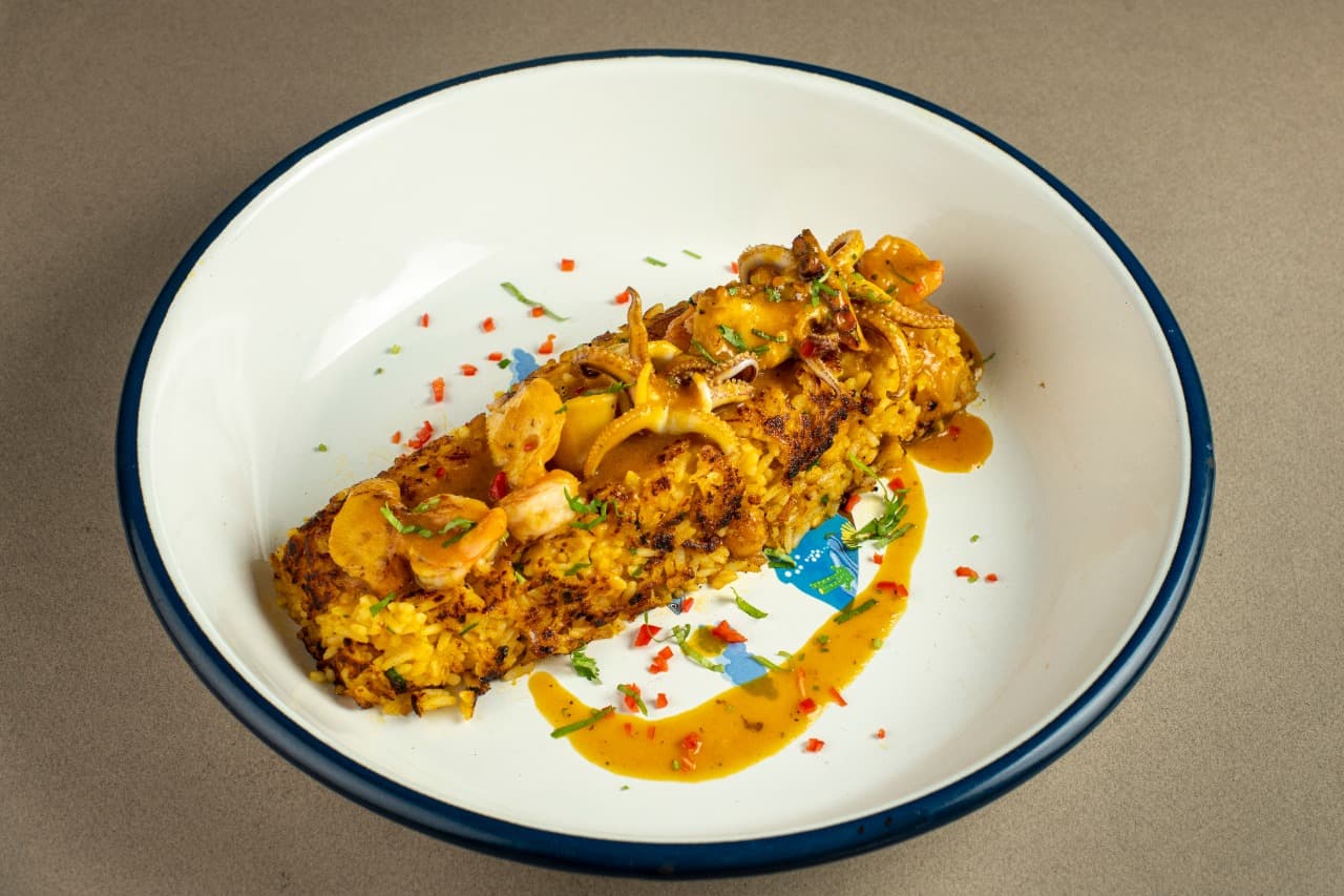 Tacu Tacu con Salsa de Mariscos