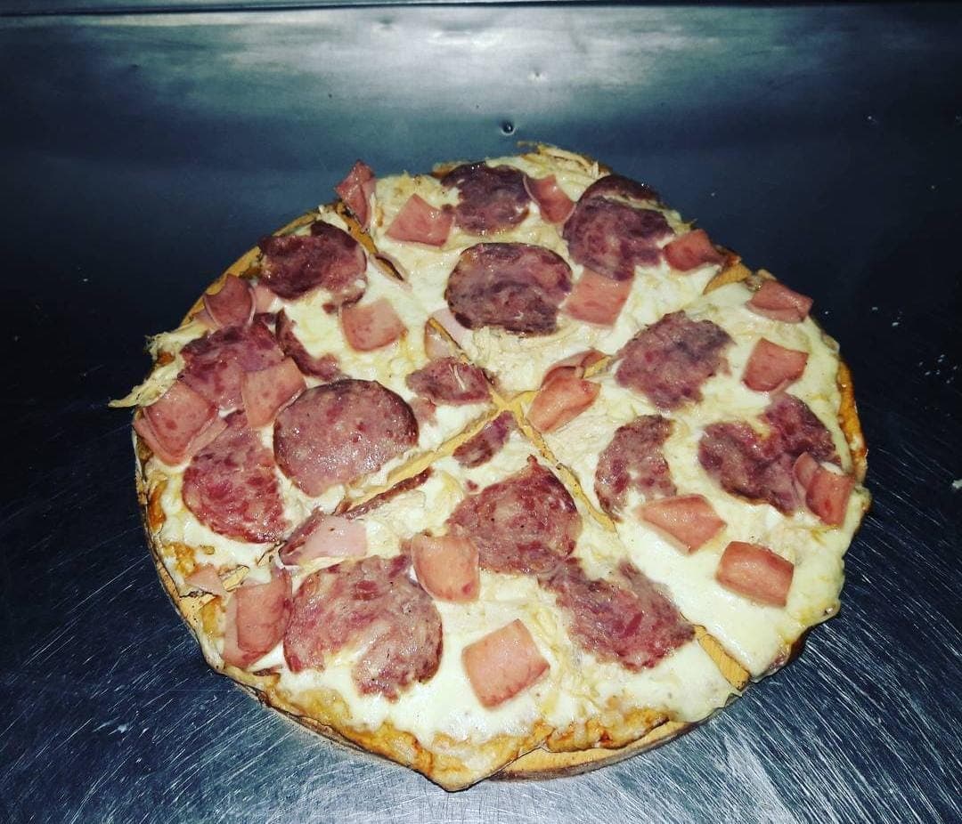 Pizza Tres Carnes