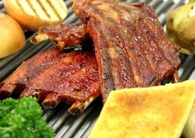 Costilla a la Parrilla yucas y ensaladas