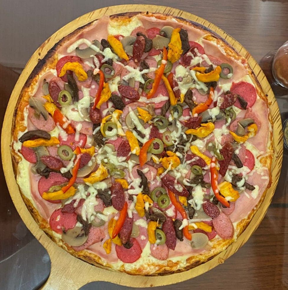 Pizza La Camila Mediana (mitad de pizza)