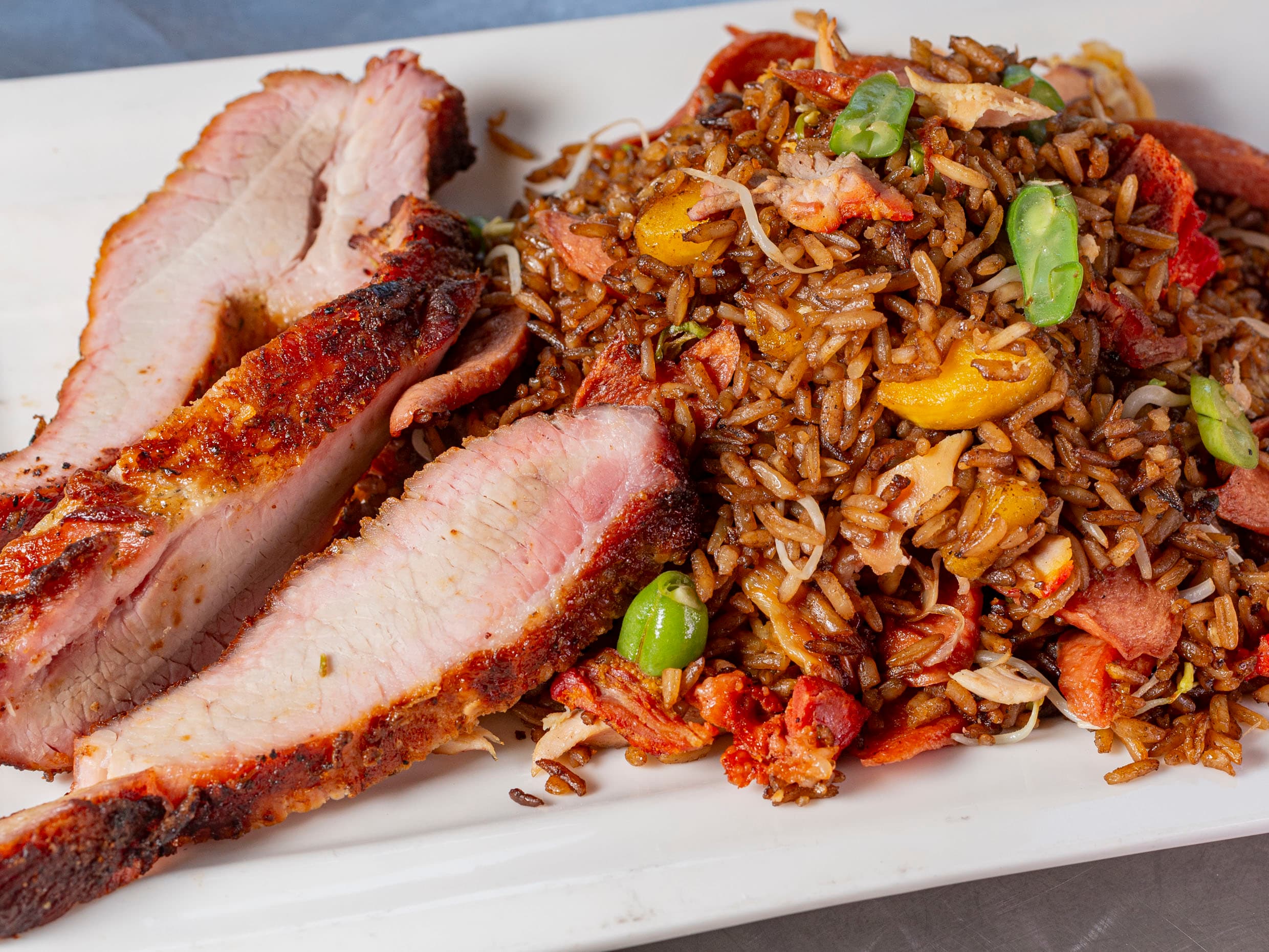 Carne al Barril de 100 g + Arroz + GaseosaPersonal