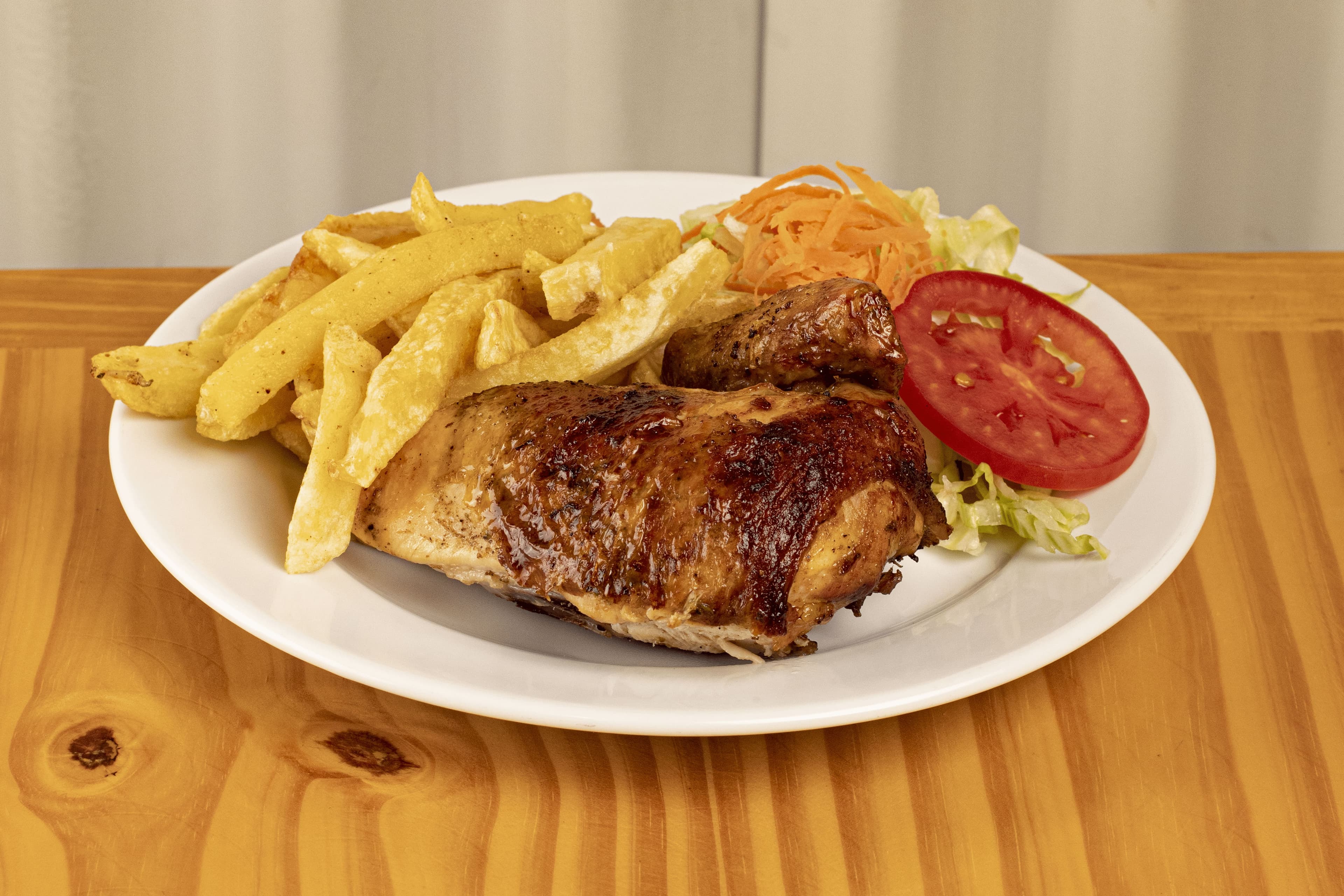 Un Cuarto de Pollo Excelencia