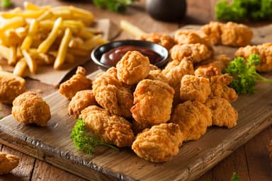 Palomitas de pollo + papas a la francesa