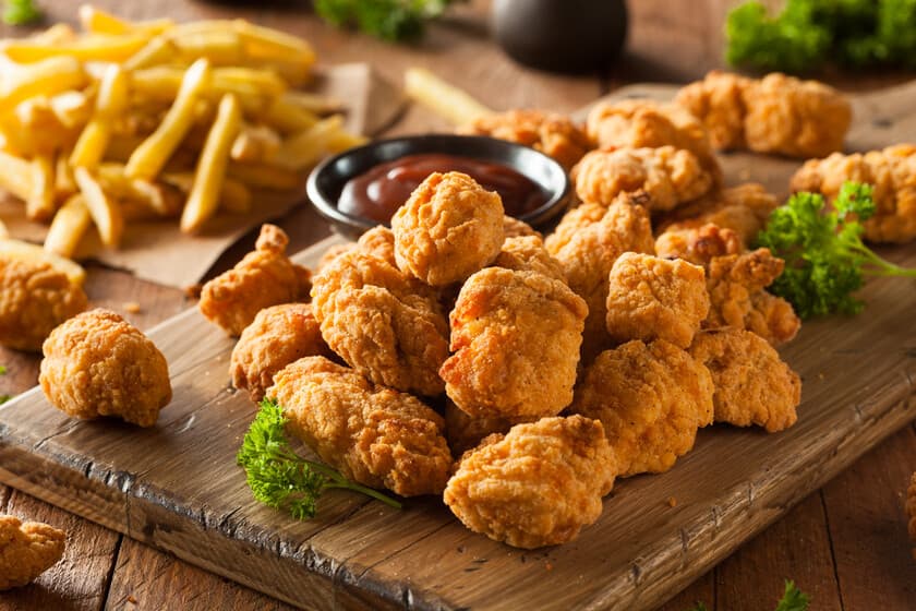 Palomitas de pollo + papas a la francesa