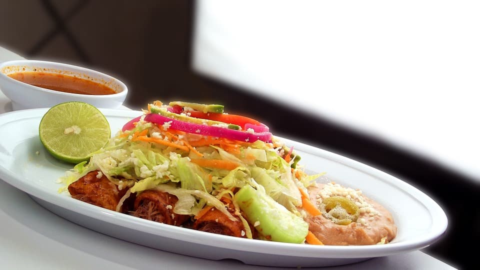 Enchiladas con pechuga empanizada