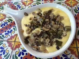 Queso Fundido con Champiñones