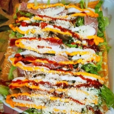Chicharrón Mixto cueritos jamón aderezos lechuga