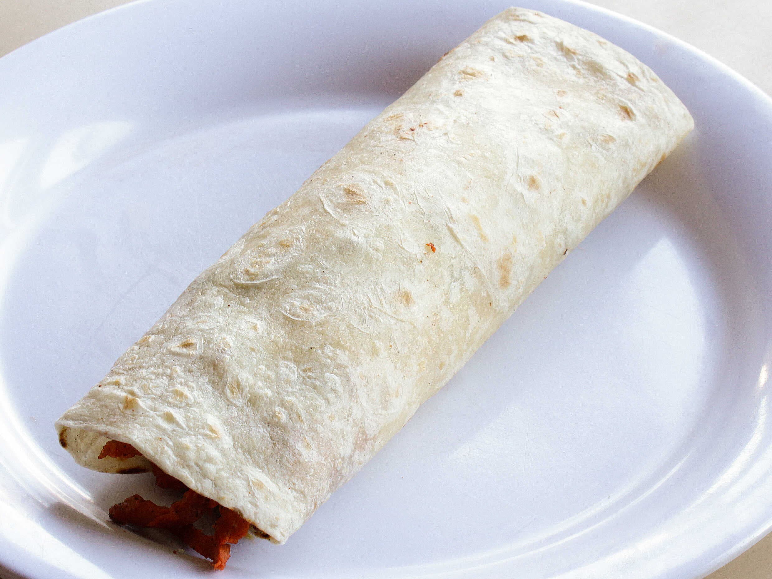 2 Tacos al Pastor con Queso + Coca Cola 600 ML