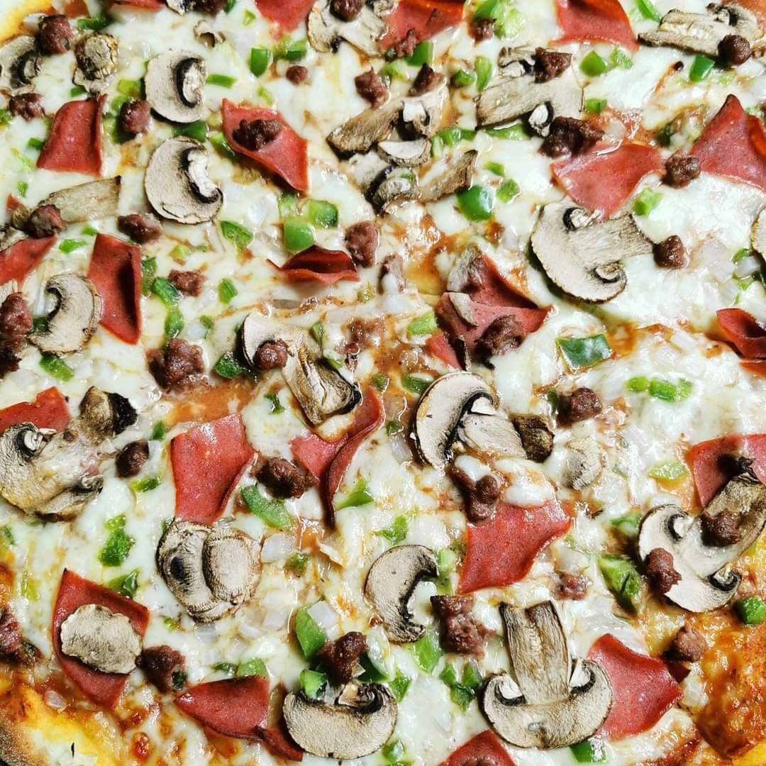 Pizza de 3 a 4 Ing + Orden de Pan con Ajo