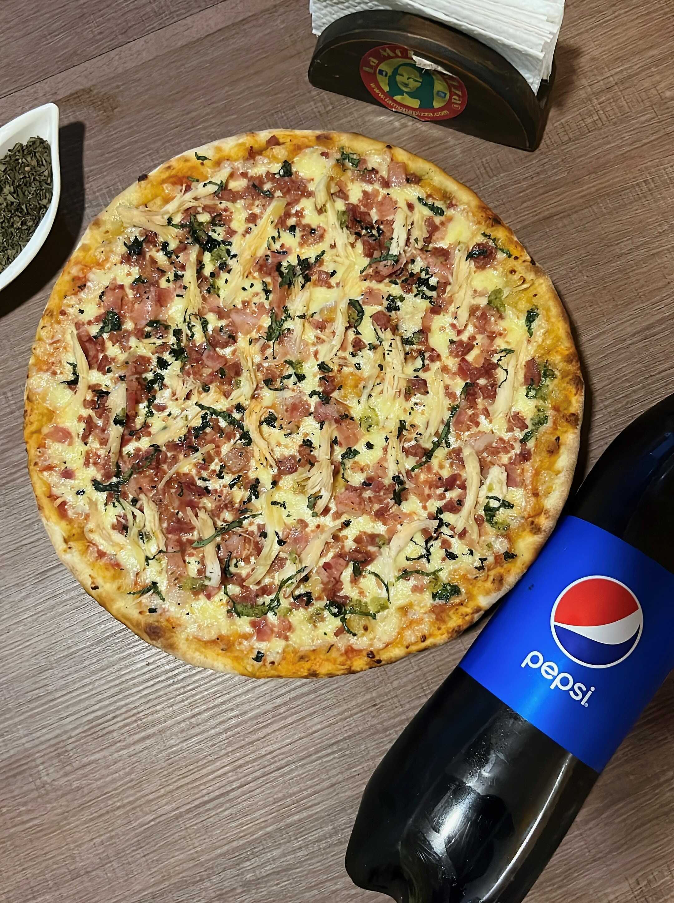 Pizza Large 8 Porciones + Bebida 1.5 Litros
