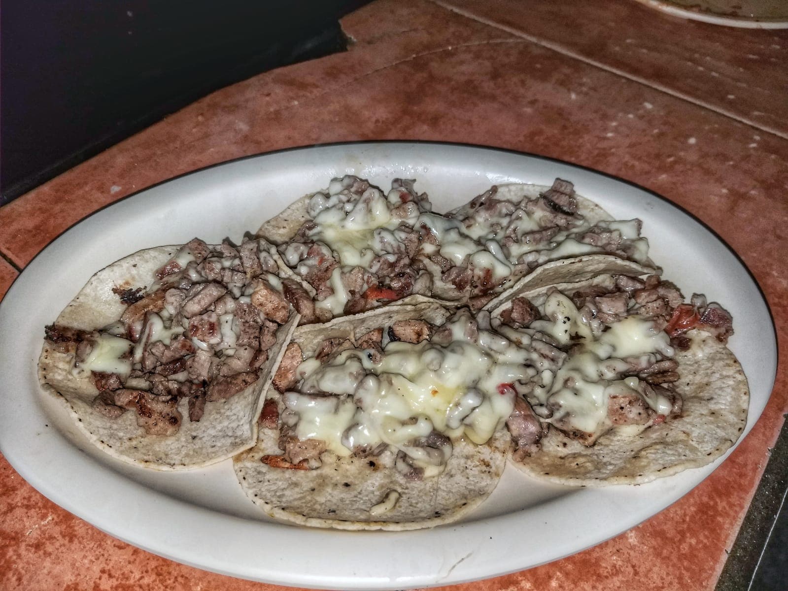 Taco de Chuleta con Queso