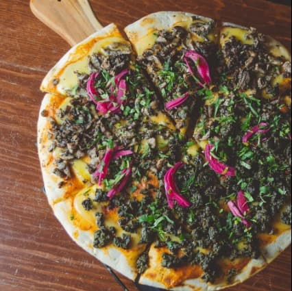 Pizza  de Trompo Negro