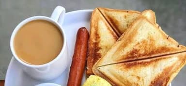 Te con Leche, Huevos Fritos y Pan