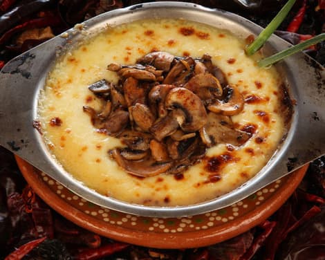 Queso con Champiñones
