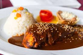 Pollo con Mole ( pierna y muslo)