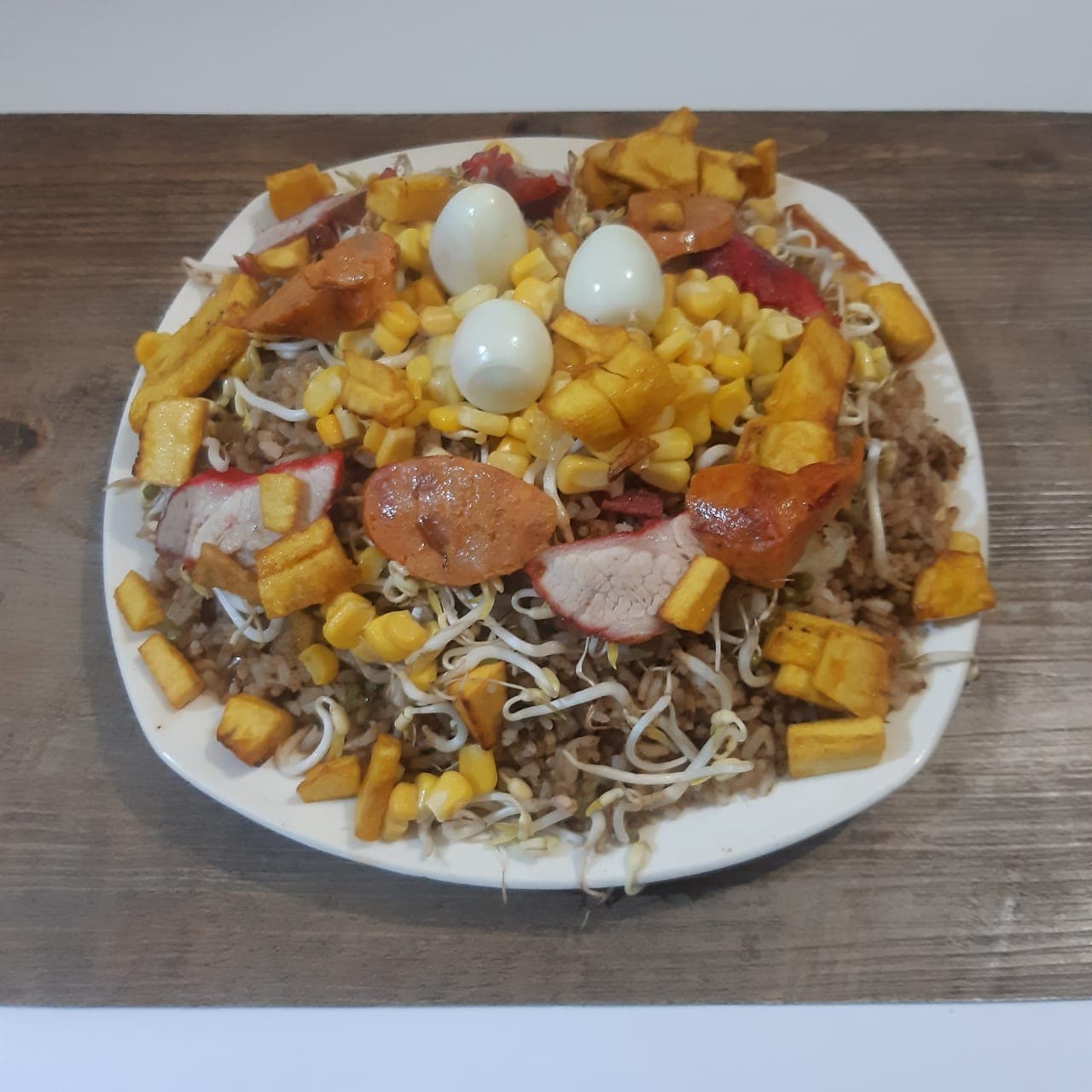 Combo Arroz Criollo con 10 piezas alitas + Bebida