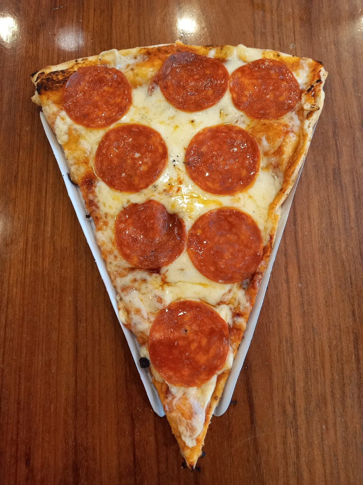 Combo Porcion de pizza + Coca cola 250 ml