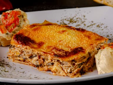 Lasagna Mixta + gaseosa 250ml