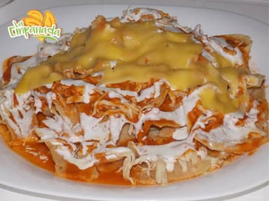 Chilaquiles 1/2 Orden (Rojos o Verdes)