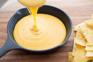Queso amarillo líquido