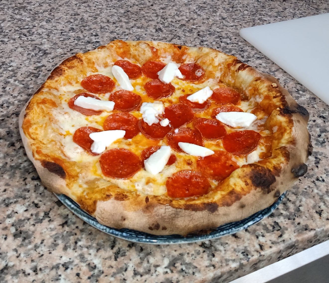 Pizza Clásica 4 porciones 🍕.