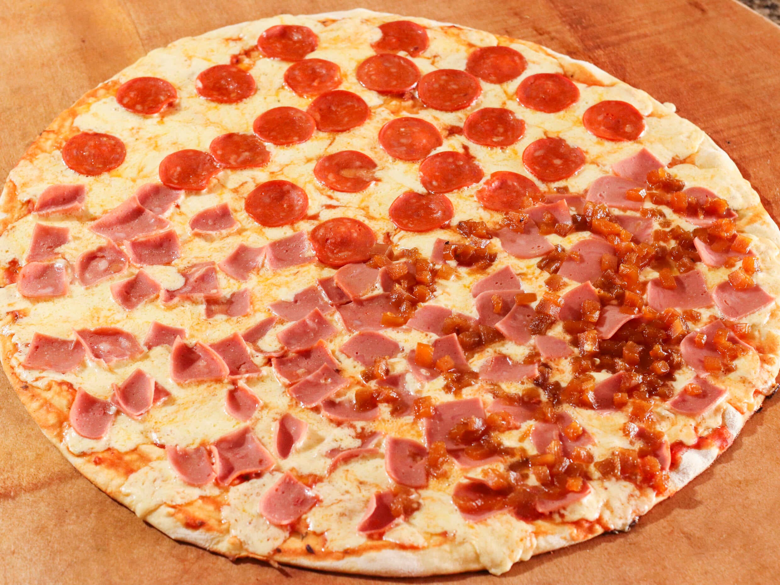 1 Pizza Carnes Porción + 1 Pizza Hawaiana Porción