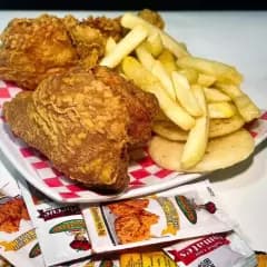 1/4 Pollo Broaster.