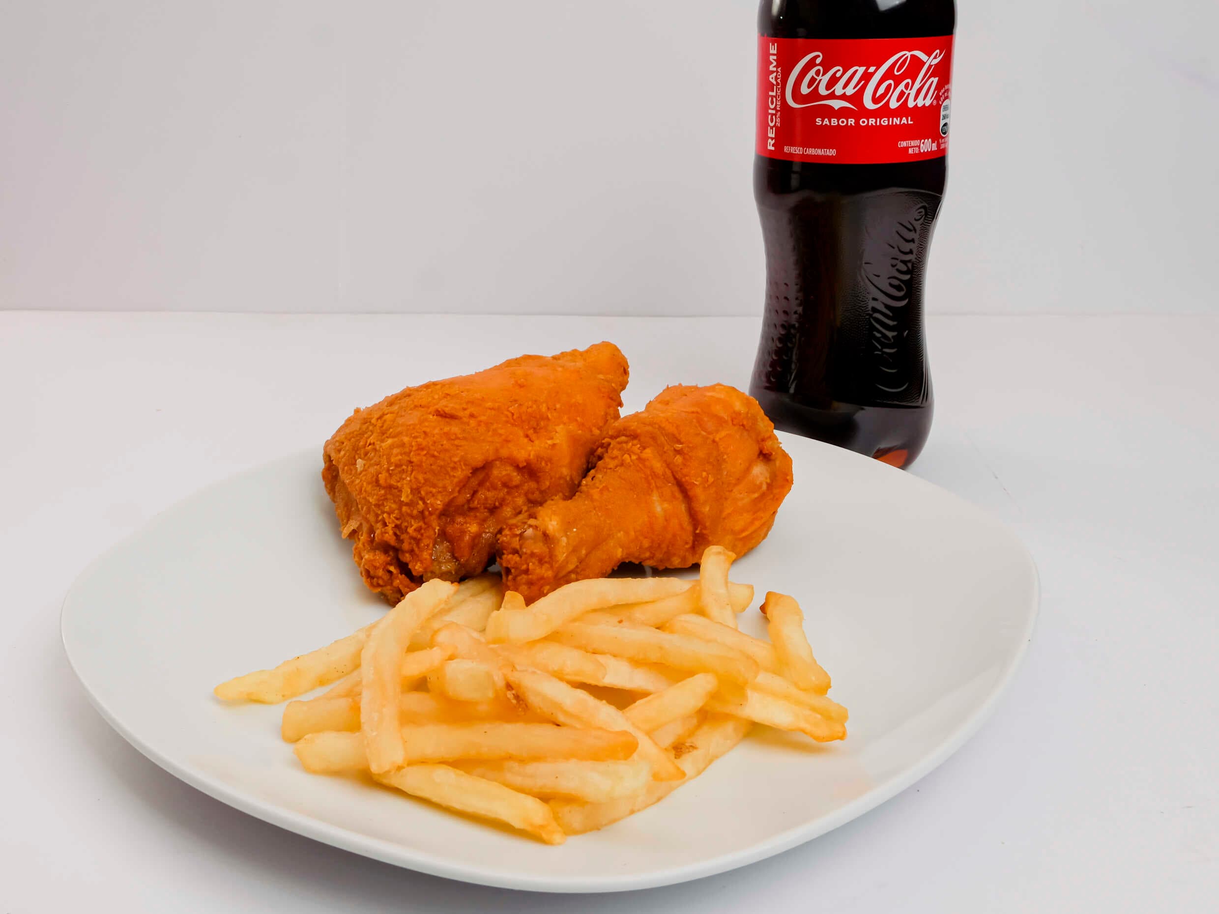 Combo 1 ( 2 piezas + papa + refresco )
