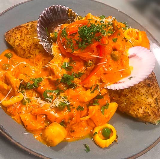 Tacu Tacu en Salsa de Mariscos