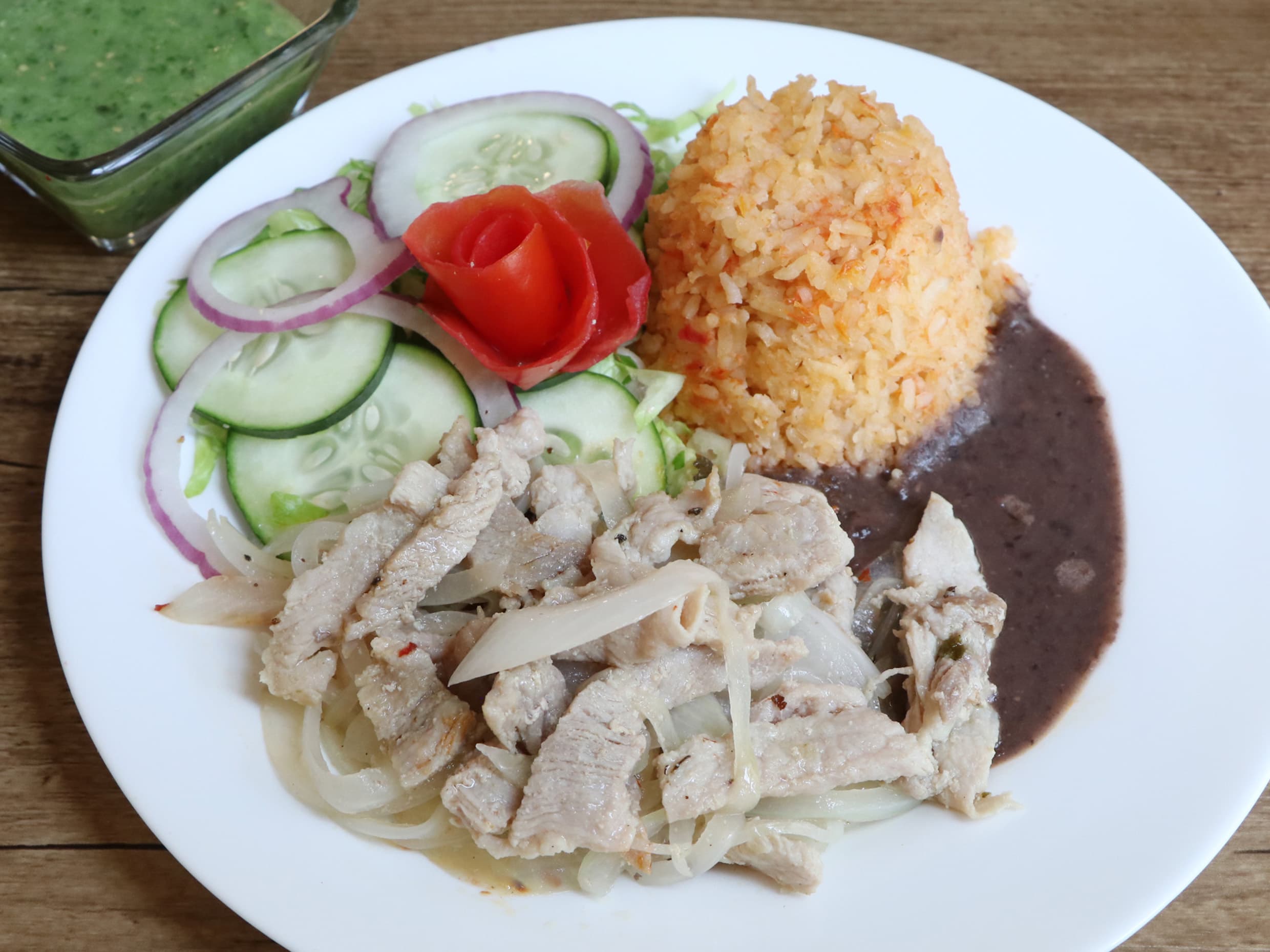 Bistecs Encebollados